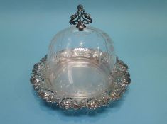 A silver plated and glass dish and cover, 23cm diameter