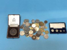Assorted coins etc, in one bag