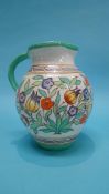 A Burleigh ware Charlotte Rhead tubelined jug, printed mark, numbered TL14