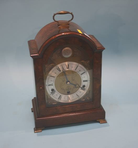 A walnut cased Elliot mantle clock