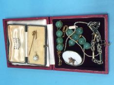 A Jade necklace, a seed pearl necklace, two pins etc. in a Harrods jewellery box