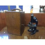 A Beck of London, model 29 microscope, with oak case
