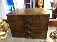 Small oak four drawer cabinet