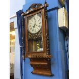 A walnut wall clock