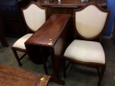 A reproduction mahogany gateleg table and a pair of chairs
