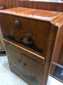 A walnut cocktail cabinet with chinoiserie decoration