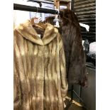 Two fur coats and a stole