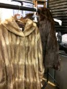 Two fur coats and a stole