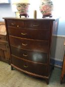 A mahogany bow front chest of drawers