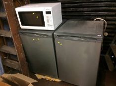 A Hot Point fridge freezer and Panasonic microwave