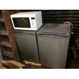 A Hot Point fridge freezer and Panasonic microwave