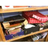 Shelf of assorted, books etc.