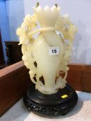 A carved Jade (?) Oriental lamp