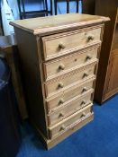 A pine six drawer chest