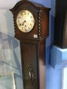 An oak cased Granddaughter clock