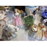 Four Royal Doulton figures