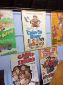 A collection of five original film posters, 'Carry on Behind', 'Carry on Henry', 'Carry on