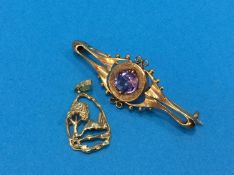 A yellow metal pendant and a brooch, stamped 9ct