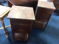 Pair of marble top oak bedside cabinets