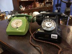A 1970'S Green phone and a Bakelite phone