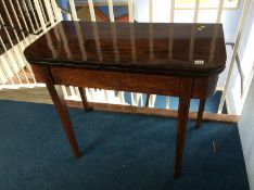 A mahogany tea table on square tapering legs, 11 x 45cm
