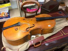 A cello with soft carry case, bears paper label to interior 'Jean Baptiste Vuillaume a Paris, 3