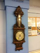 A carved mahogany two glass barometer by Watson and Sons, 313 High Holborn London, 101cm high