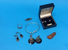 A quantity of silver dress jewellery and a pair of 9ct gold mounted earrings, with matching pendant