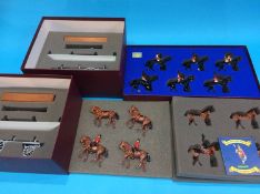 Three Britains boxed sets 'The Life Guards Mounted Band' and two 'Pontoon section Royal