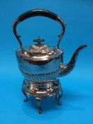 A silver plated spirit kettle and stand