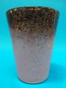 A Monart glass vase of graduating purple and pink colours, speckled with gold, bears paper label,