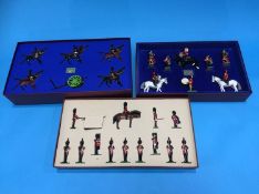 Three boxed sets of Britains, Royal Scots Guards, Charge of The Light Brigade and The Queens Company