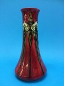 A Minton Ltd Art Nouveau vase with tube lined decoration on a red ground, impressed marks No1,
