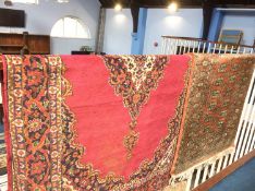 A Pakistani Bokhara rug with burnt orange ground, 154x92cm and a modern Persian design rug on pink