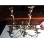 A pair of plated candelabra