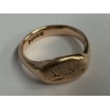 A Gents 9ct cygnet ring, 9 grams