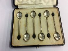A set of six Asprey silver coffee spoons