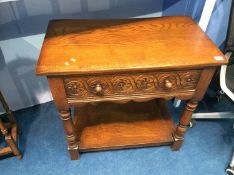 An oak single drawer side table