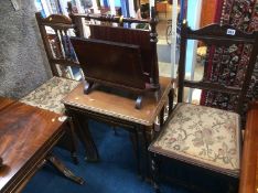 A pair of Edwardian chairs, nest of tables and a magazine rack