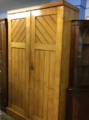 A Bragg and Co. of Newcastle two door wardrobe