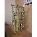 Quantity of costume jewellery and stand