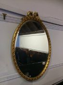 Gilt oval mirror