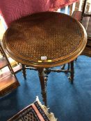 A walnut occasional table with lattice work top, 61cm wide