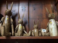 A family of four jointed rabbits