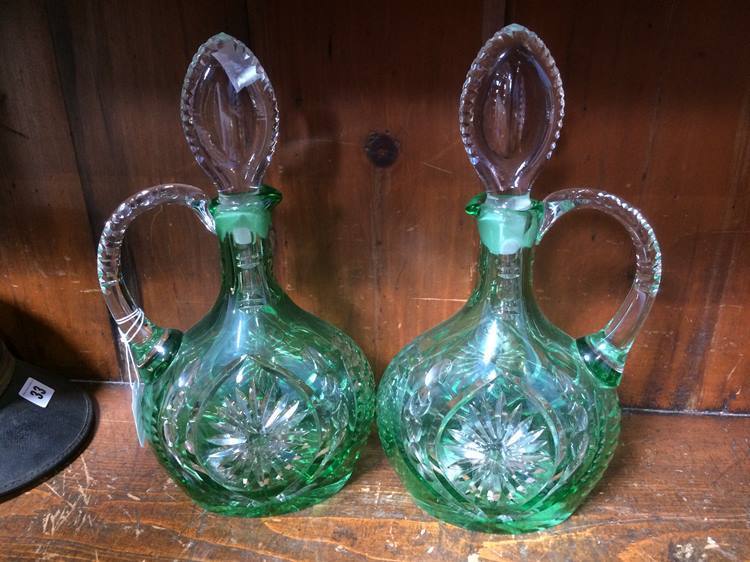 A pair of green flashed water jugs