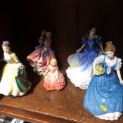 Five Royal Doulton figures