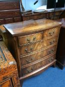 A Chapman's 'Siesta' bow front chest of drawers, 71 cm wide