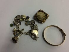 A silver charm bracelet etc.