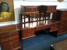 A Stag Minstrel chest of drawers, dressing table, bedside drawers etc,