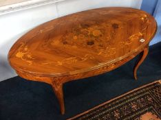 An Italian style marquetry oval coffee table